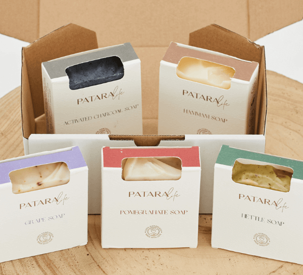 Five olive soaps grouped together