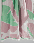 Turkish Beach Towel featuring a vibrant leaf pattern in greens and pinks
