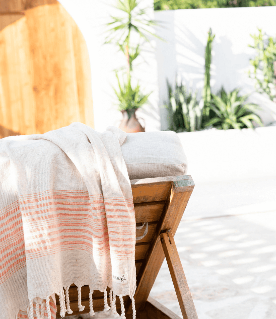 "Kas" Linen/Cotton peshtemal draped over sun lounge