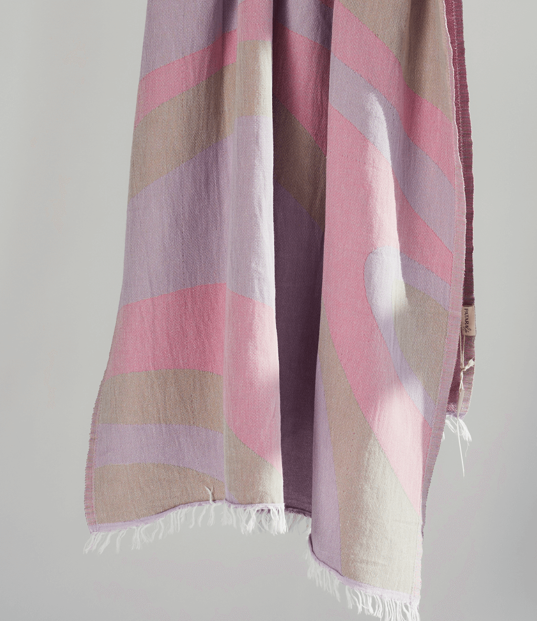 Turkish Beach Towel featuring a dynamic abstract wave design in pastel shades, perfect for beach days and quick drying.