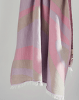 Turkish Beach Towel featuring a dynamic abstract wave design in pastel shades, perfect for beach days and quick drying.