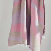 Turkish Beach Towel featuring a dynamic abstract wave design in pastel shades, perfect for beach days and quick drying.