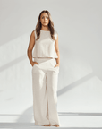 Model showcasing a Linen Wide Leg & Crop Top Set in a neutral tone, highlighting comfort and sophistication.