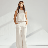Model showcasing a Linen Wide Leg & Crop Top Set in a neutral tone, highlighting comfort and sophistication.