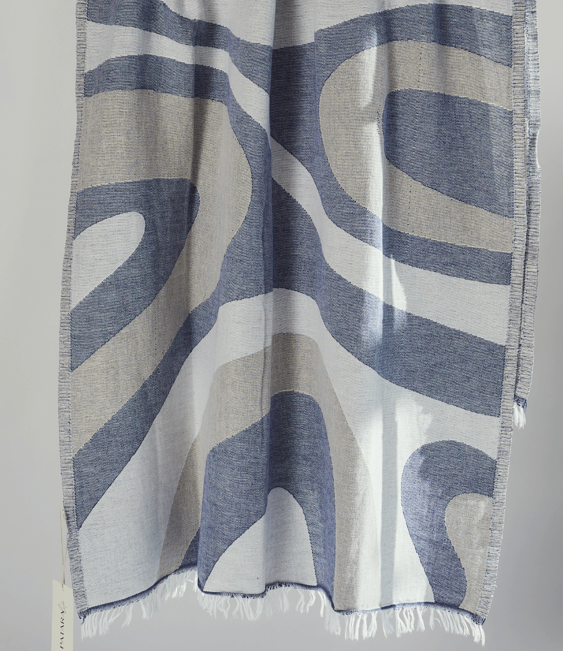 Turkish Beach Towel featuring dynamic blue and beige wave design, made from quick-drying Turkish Cotton, perfect for beach use.