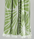 Radiance Turkish Beach Towel featuring a green sunburst pattern, made from soft organic cotton with fringe detail.