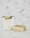 Nettle Cold Pressed Olive Oil Soap Bar by Patara, showcased with its packaging and a textured background.