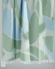 Turkish Beach Towel featuring a lush leaf pattern in greens and blues