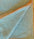 Close-up of fabric with blue and beige geometric pattern