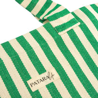 close up of green and white stripe beach tote bag 